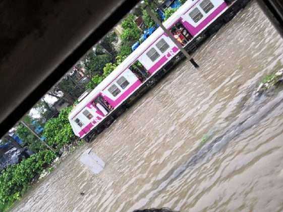 train running slow due to waterlogging on sion track