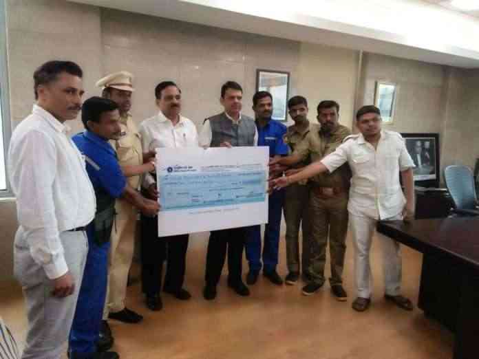 CM giving cheque