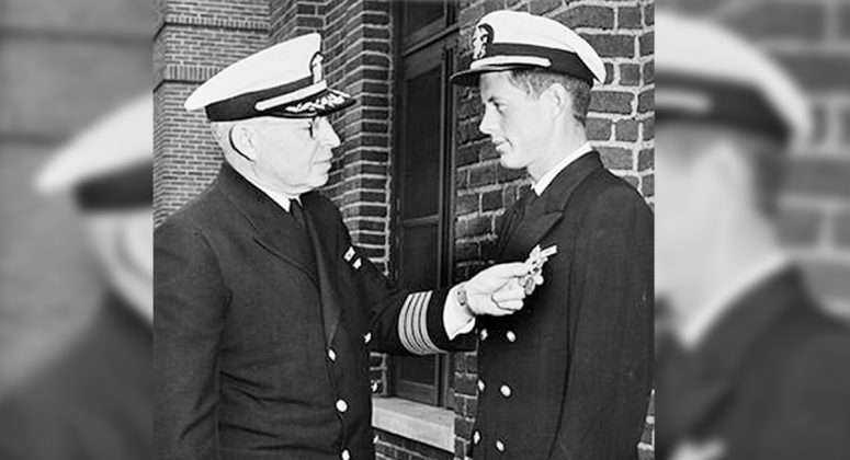 John Kennedy being awarded the Navy and Marine Corps Medal in June 1944