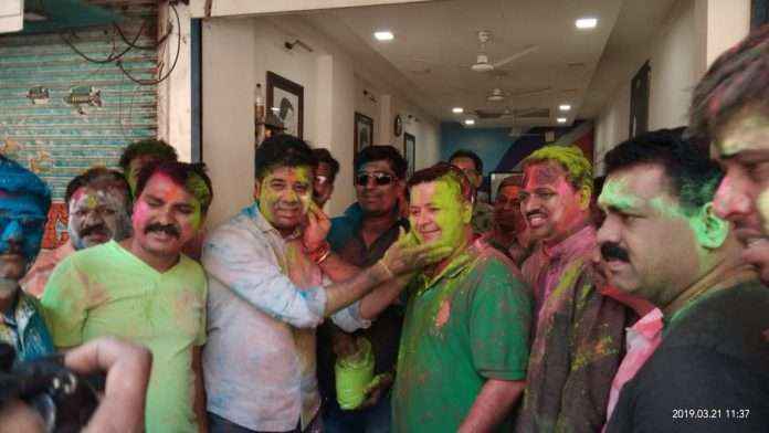 NCP and MNS party workers together celebrate Holli