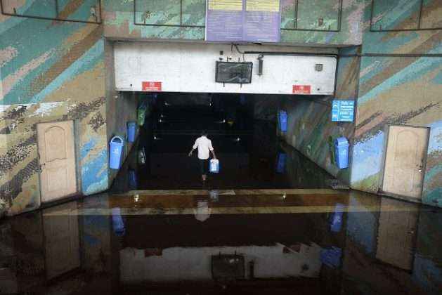 passengers are troubles due to water on subway near turbhe railway station