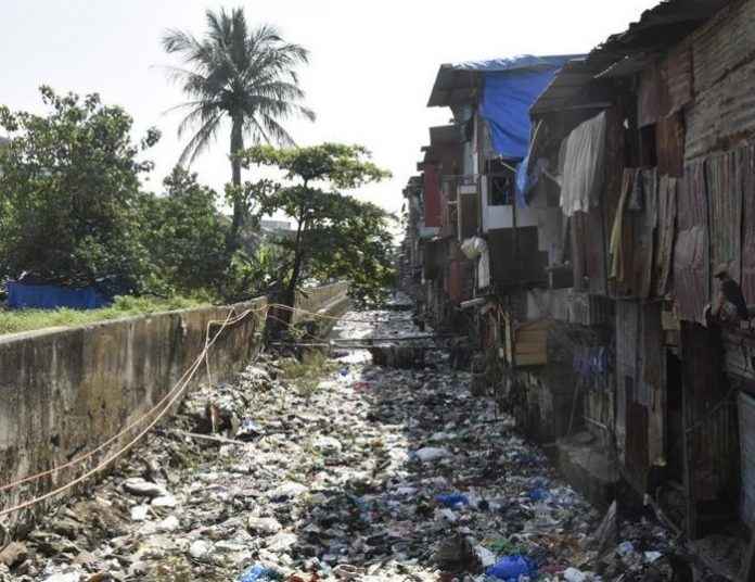 action taken against people who throw garbage in drainage