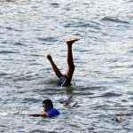 boys swimming at dadar chaupaty