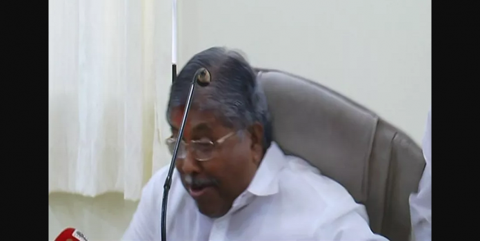 chair breaks down at press conference and chandrakant patil falls down in solapur press conference