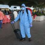 AIRPORT staff in ppe kit