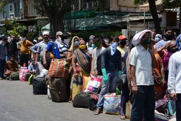 Thousand of Migrant workers from Mumbai queue up to board Shramik Special train outside CSMT