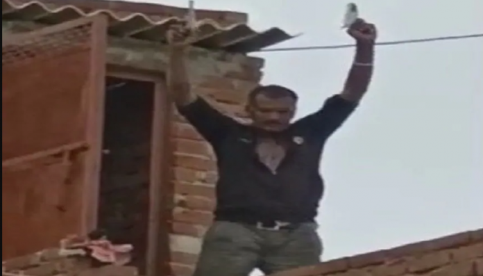 uttar pradesh man kept dancing on the terrace and firing fiercely video viral