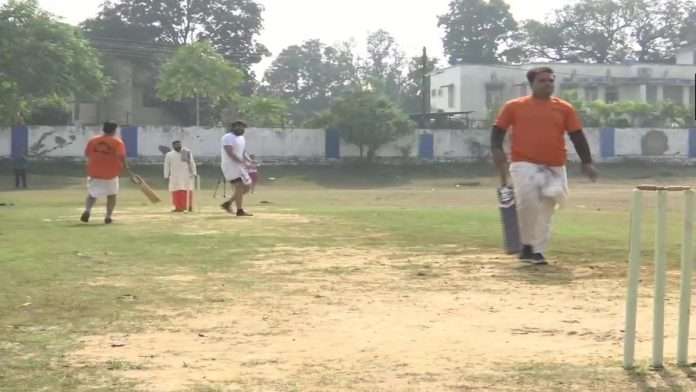 A unique cricket match dressed in dhoti-kurta
