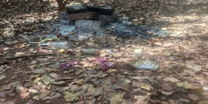 Alcohol bottles and plastic waste in the Shri Ghatai temple area of Kas pathar
