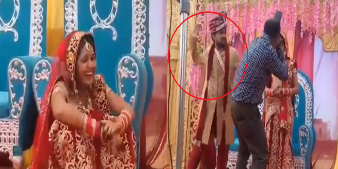 groom slap photographer on marriage reception stage bride lol reaction video viral on social media