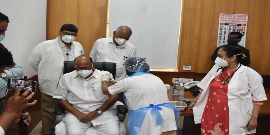  sharad pawar takes first shot of covid 19 vaccine at jj hospital in mumbai 