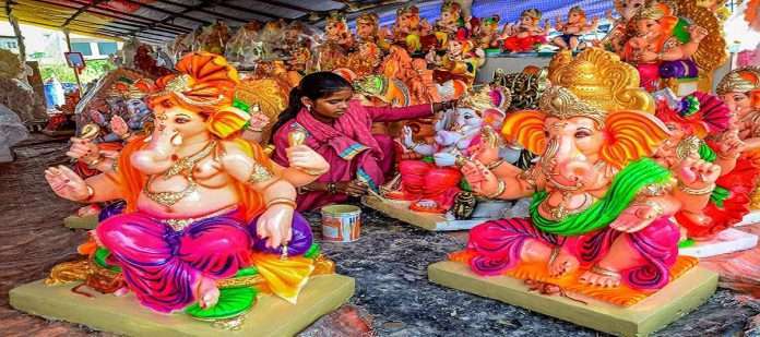 The coloring of Ganesha murti is in the finishing stage