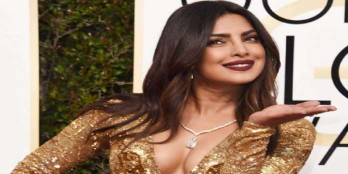 priyanka chopra looks hot and sexy in golden shimmery gown for globes award red carpet look photos