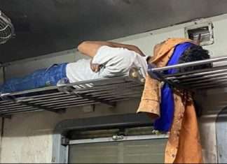 man sleeping on the luggage rack of mumbai local goes viral internet