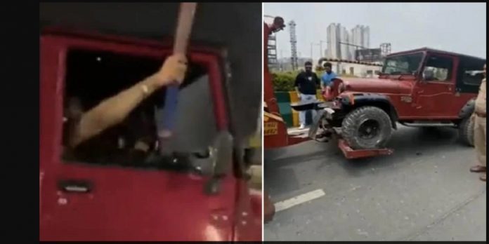 man performing dangerous stunt on noida road arrested up police shares video