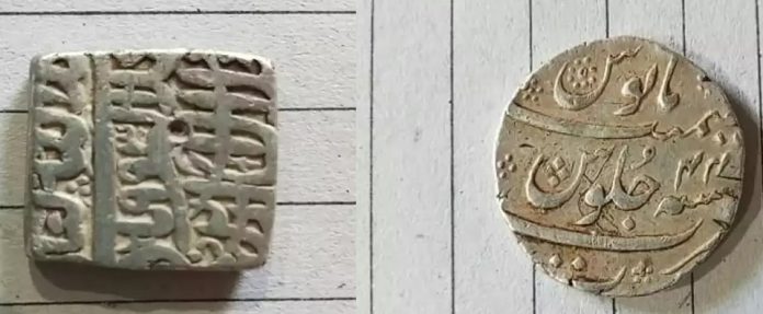 two silver coins of akbar and aurangzeb from mughal times found in chandrapur