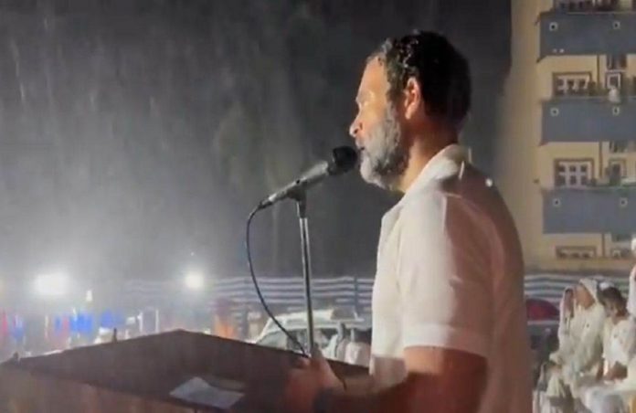 bharat jodo yatra congress leader rahul gandhi continues speech amid rain in maysuru watch video