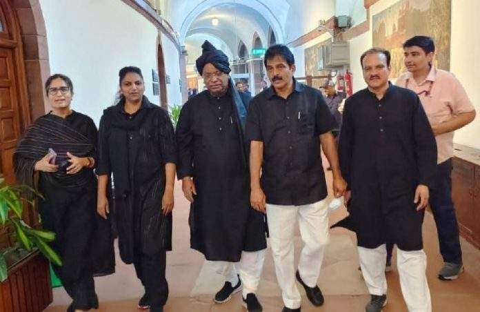 Congress Protest in black Dress