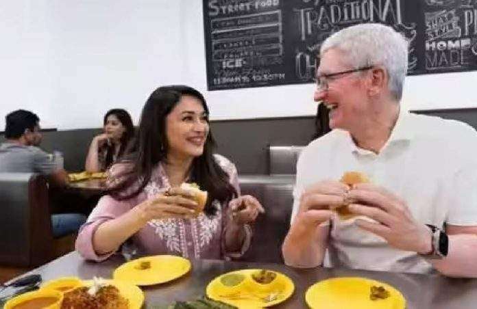 Apple CEO Tim Cook with Madhuri Dixit relishes vada pav in Mumbai